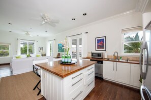 Villa | Private kitchen | Full-size fridge, microwave, oven, stovetop - Seaside Escape: Private Beachfront Villa With Infinity Pool (Rock Sound)