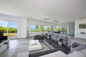 Villa | Living area - Shoreline Serenity: Secluded Coastal Villa (North Palmetto Point)