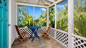 Garden view - Pink Sands Retreat: Beachfront Cottage With Views (North Palmetto Point)