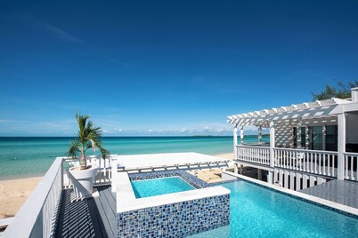 Secluded Luxury: New Beachfront Home With Pool