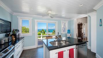 Villa | Private kitchen | Full-size fridge, microwave, oven, stovetop