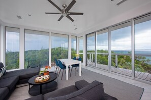32-inch LCD TV with satellite channels - Modernized Beach House With Pool (Governor's Harbour)
