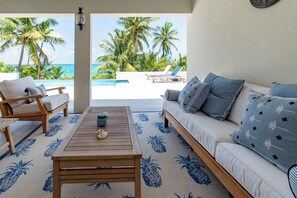 Villa | Living area - Pink Sand Paradise: Luxury Home With Heated Pool (North Palmetto Point)
