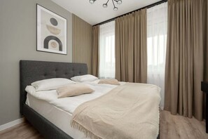 1 habitación, tabla de planchar con plancha, wifi y ropa de cama 