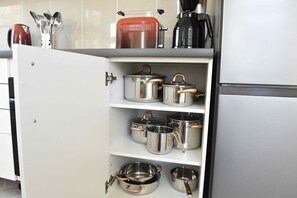 Condo Confort, 3 habitaciones | Cocina privada | Refrigerador, microondas, horno y parrilla de estufa