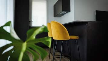 Exclusive Apartment, Garden View 2 | Living area | 42-inch Smart TV with digital channels, Netflix, Hulu