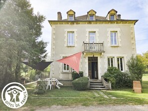 A two-story building with a balcony, a front door, and a small porch area. - Gary's Mill - SAINT-LAURENT-LES-TOURS (SAINT-LAURENT-LES-TOURS)