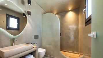 Aeolos Suite with Private Hot Tub | Bathroom | Shower, hair dryer, towels, soap