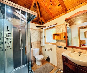 Shower, hair dryer, towels, soap