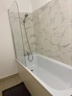 Hair dryer, towels, soap, shampoo