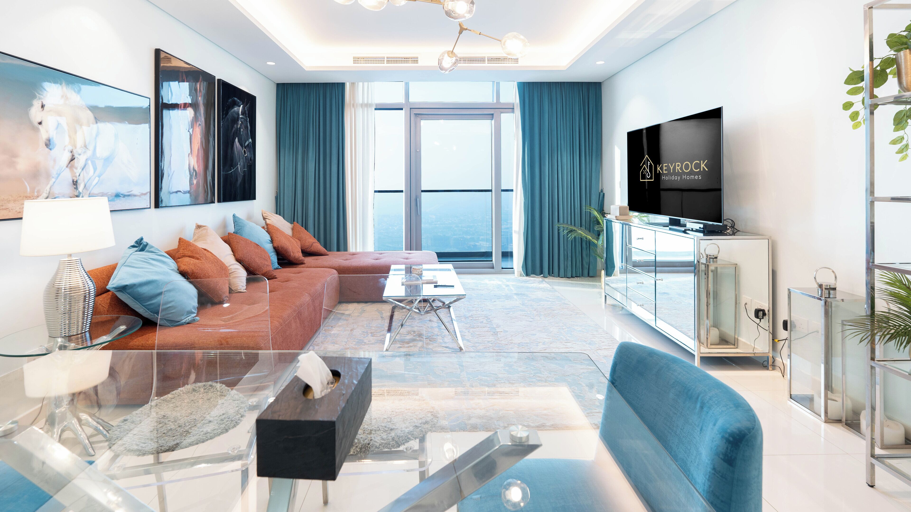 Deluxe Apartment, 2 Bedrooms, Balcony, City View | Living area | 65-inch flat-screen TV with digital channels