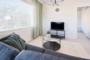 Classic Apartment | Living area | Flat-screen TV