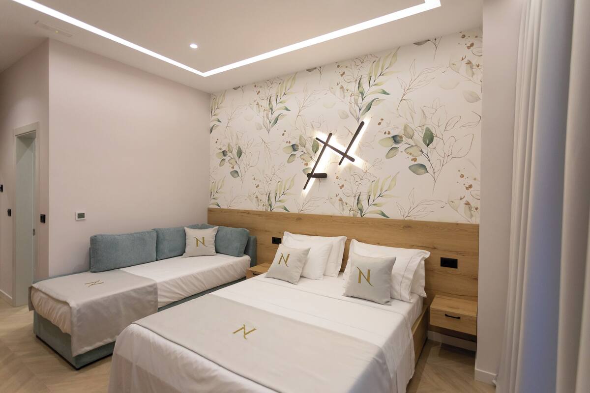 Junior Triple Room, Balcony, City View