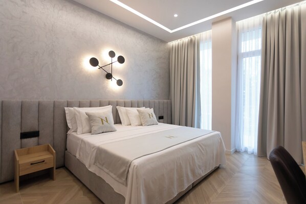 Comfort Double or Twin Room, Balcony, City View | Minibar, in-room safe, desk, soundproofing