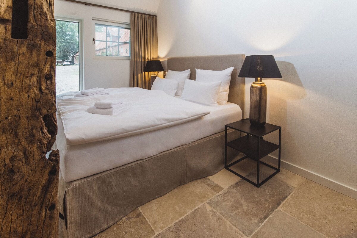 Appartamento, vista giardino | Tende oscuranti, ferro/asse da stiro, Wi-Fi gratuito