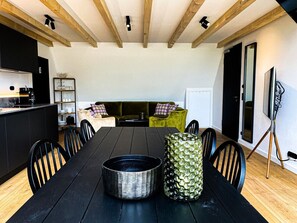 Presidential Condo, Garden View | Living area | Flat-screen TV - Gut Damp (Damp)