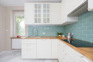 Apartment, 1 Bedroom, Balcony | Private kitchen | Microwave, oven, electric kettle, dining tables - Apartment Near Old Town by Renters (Warsaw)