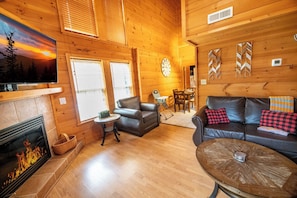 TV, fireplace - Tranquil 2BD Cabin w/ HOT TUB! Arcade + Near Town (Gatlinburg)