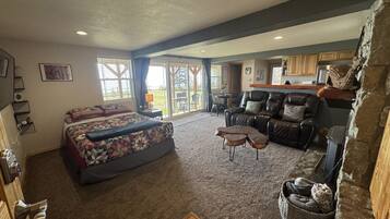 1 bedroom, desk, iron/ironing board, travel crib