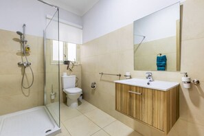 Shower, hair dryer, towels, soap