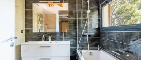 Shower, hair dryer, towels, soap