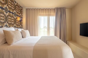 Kahden hengen huone, parveke | Ylelliset vuodevaatteet, ilmainen Wi-Fi, vuodevaatteet