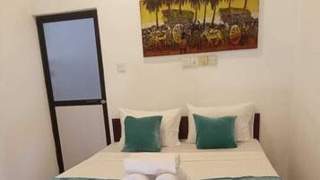 Fer et planche Ă repasser, draps fournis