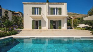 A two-story building with a swimming pool in front. - Hedera Estate, Villa Hedera XVIII (Mlini)