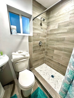 Shower, towels, soap, shampoo
