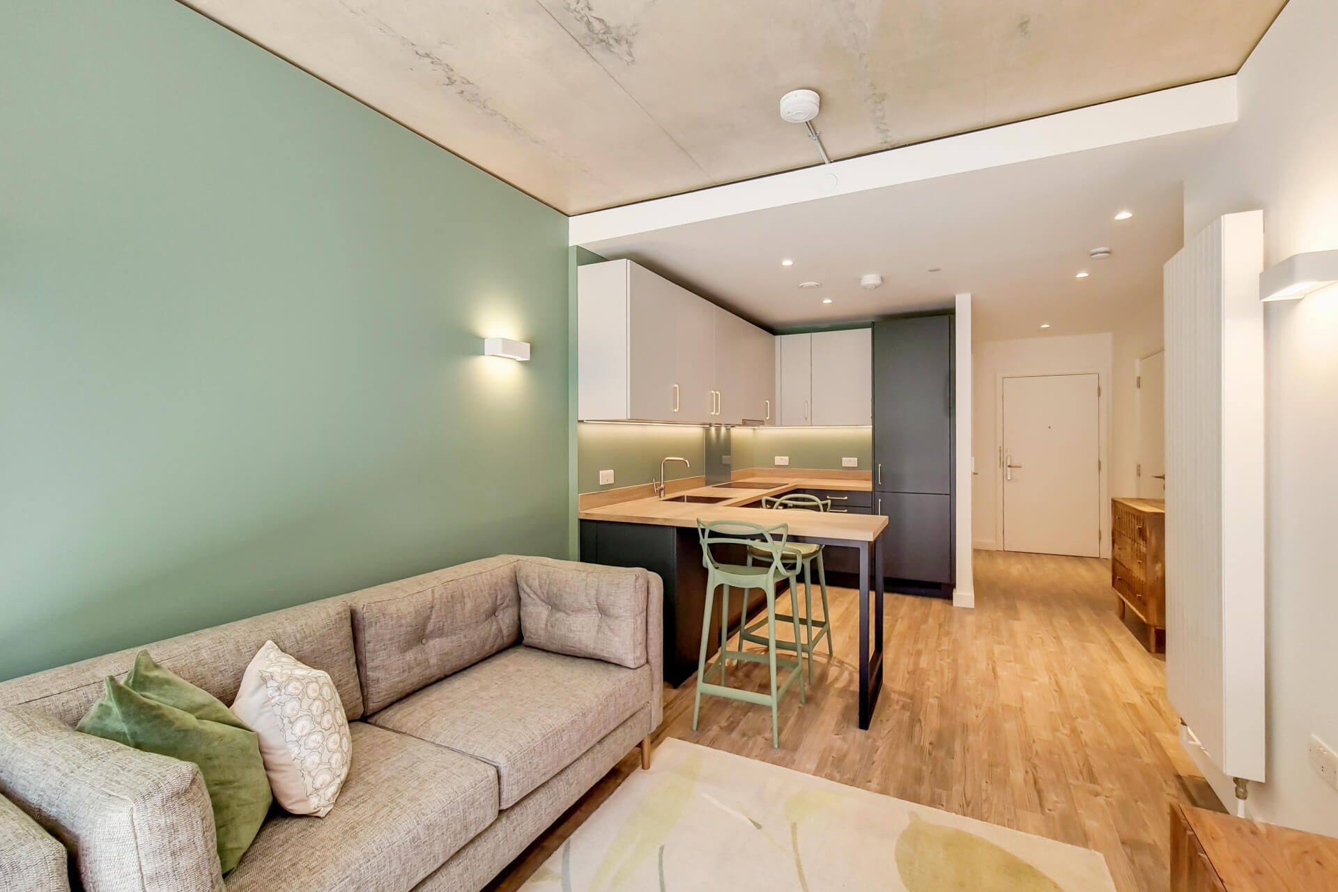 Apartment, 1 Bedroom | Living area | 50-inch flat-screen TV with digital channels