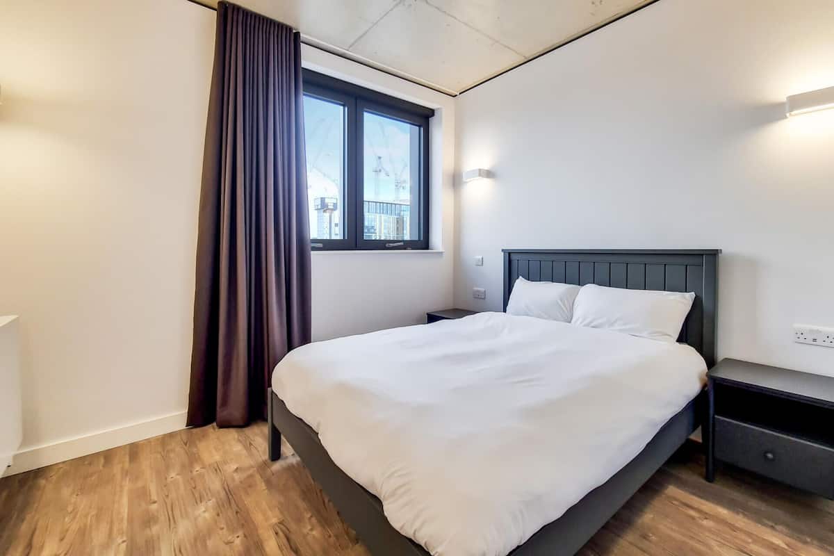 Apartment, 2 Bedrooms | Blackout drapes, iron/ironing board, WiFi (free), bed sheets