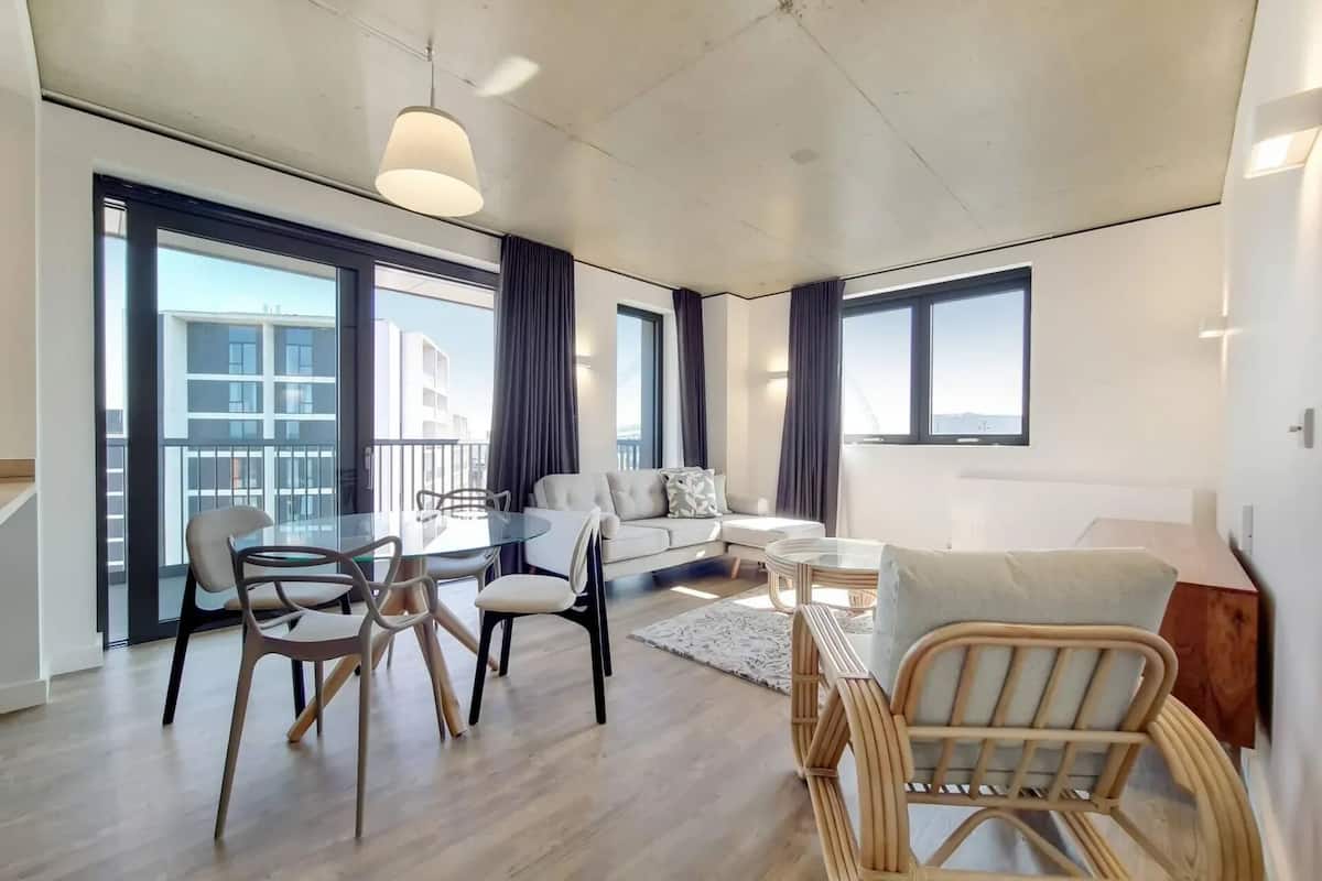 Apartment, 4 Bedrooms | Living area | 50-inch flat-screen TV with digital channels