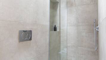 Shower, eco-friendly toiletries, hair dryer, towels