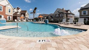 A swimming pool with lounge chairs and a '3 FT. NO DIVING' sign. - 5 BD/5BA Themed House Near Disney (Kissimmee)
