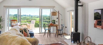 A luxury cottage with private Hot Tub and stunning countryside views.