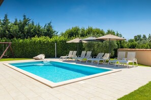 Et oppvarmet basseng