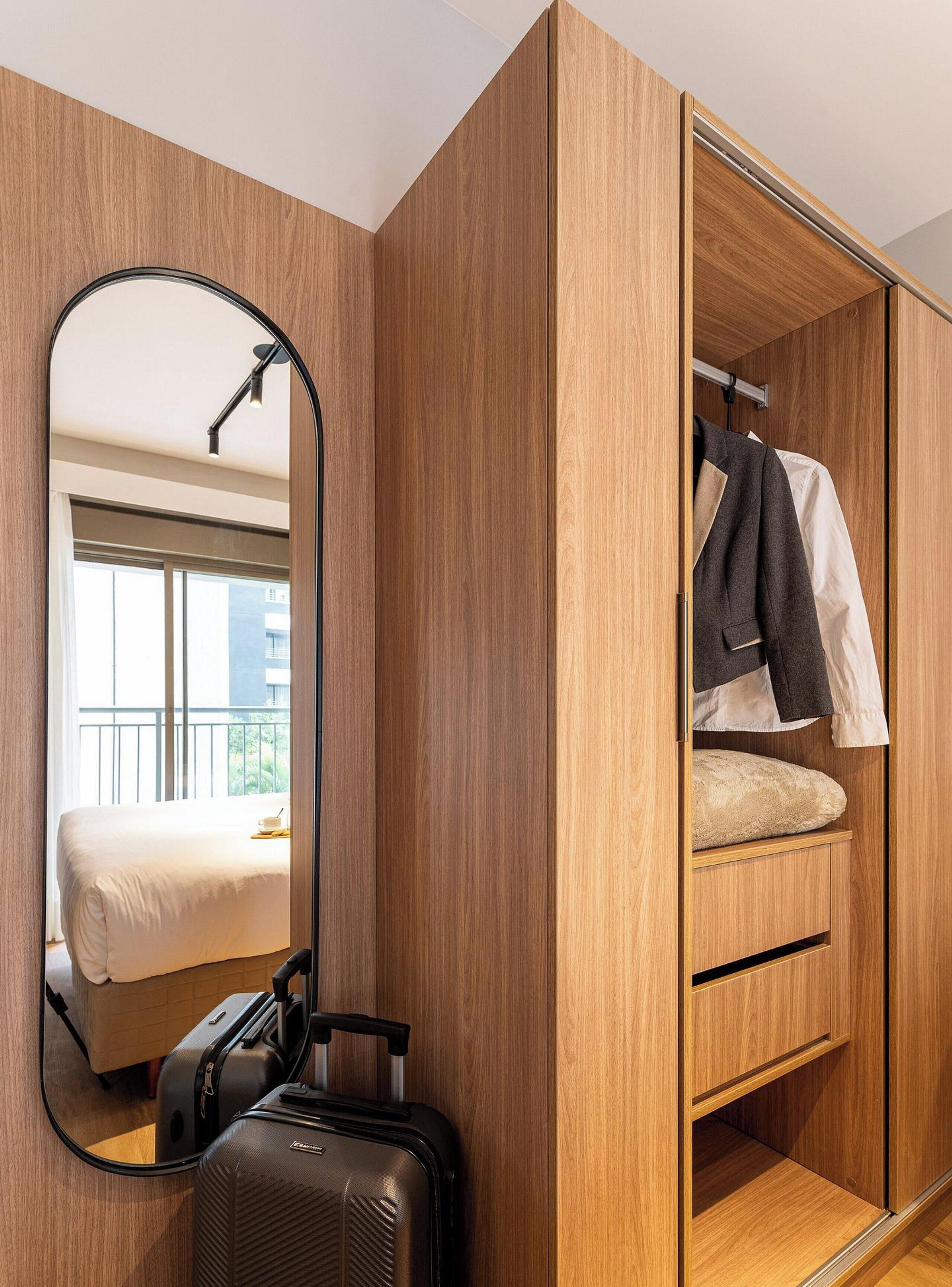 Comfort Studio | Desk, laptop workspace, blackout drapes, iron/ironing board