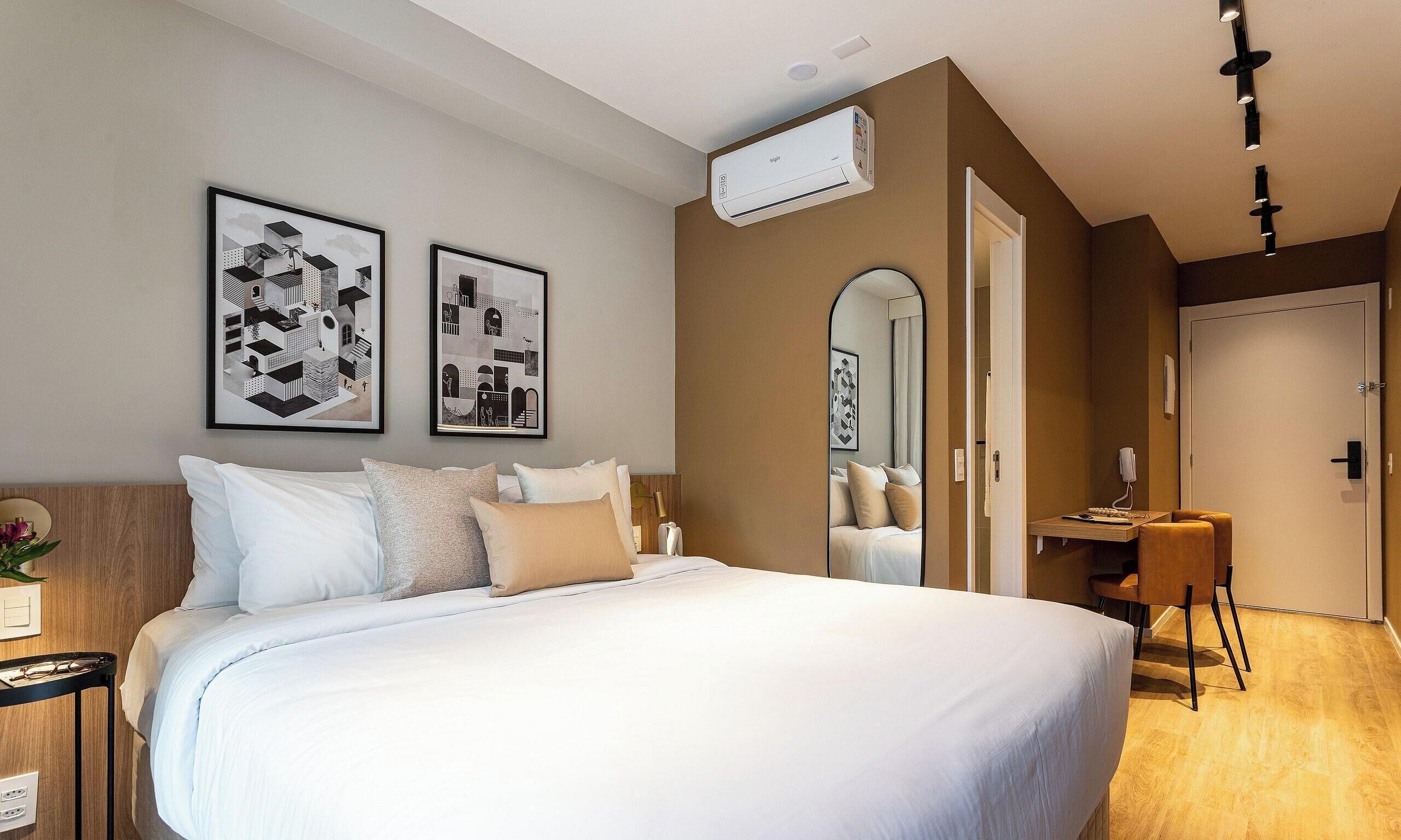 Business Studio | Desk, laptop workspace, blackout drapes, iron/ironing board