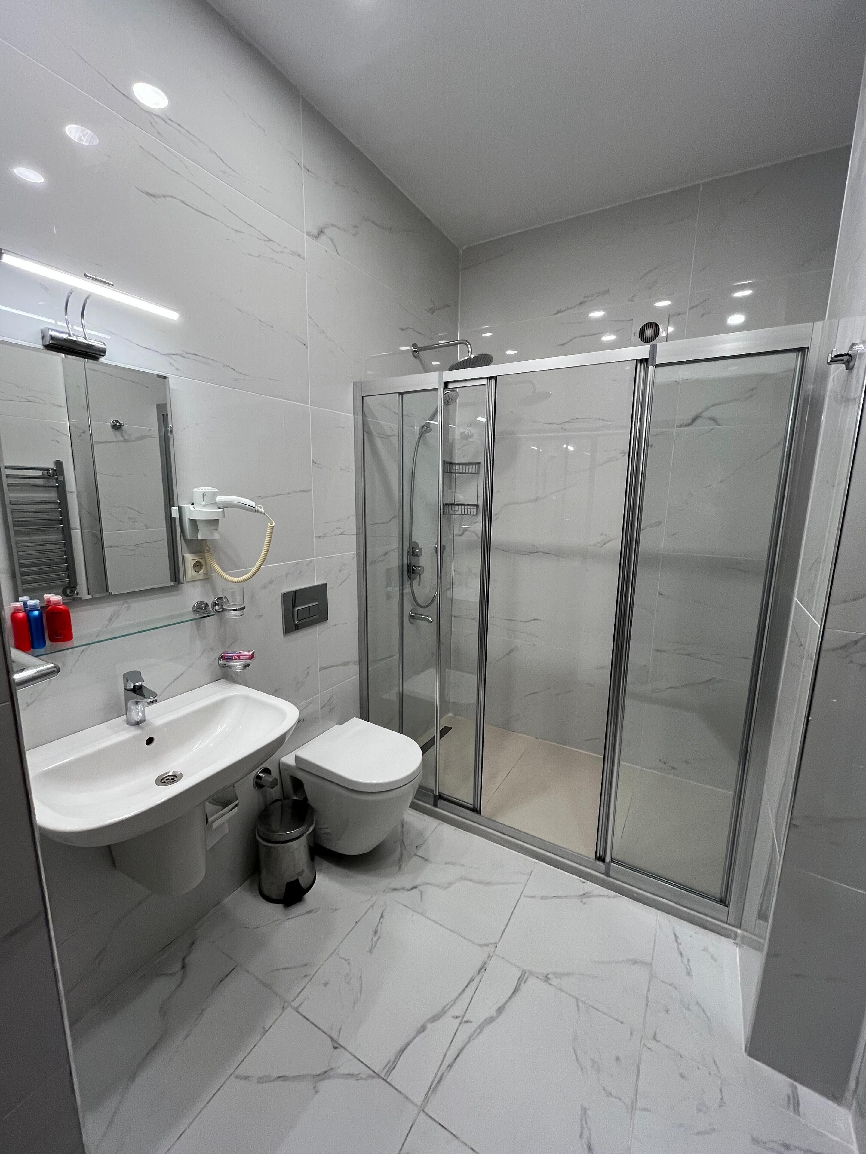 Shower, hydromassage showerhead, hair dryer, soap