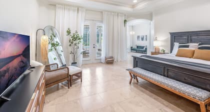 Rare Find! Mediterranean Inspired Villa with Heated Pool and Private Mini Golf