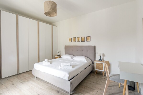 1 bedroom, desk, iron/ironing board, travel crib
