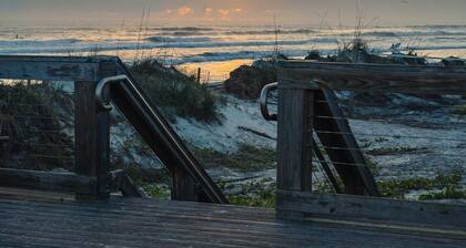 Steps to Beach and located in the heart of the Flagler Ave. district.