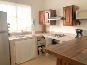 Vila grand | Cozinha privada | Geladeira, micro-ondas, cooktop, cafeteira/chaleira