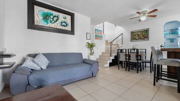 Grand Villa | Living area | 44-inch Smart TV with cable channels