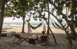 On the beach, sun-loungers, beach towels