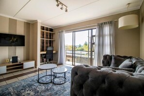 Living area - Tripleg Apartments 1 (Sandton)