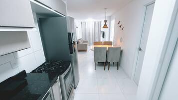 Apartment | Private kitchen | Full-size fridge, microwave, oven, stovetop