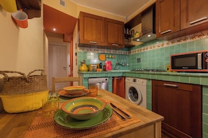 Apartment, Balcony | Private kitchen | Espresso maker, electric kettle, toaster