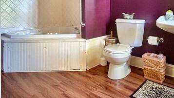 Jetted tub, hair dryer, towels, soap