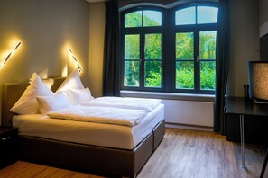 King Suite with Spa Bath | 1 bedroom, premium bedding, down comforters, blackout drapes